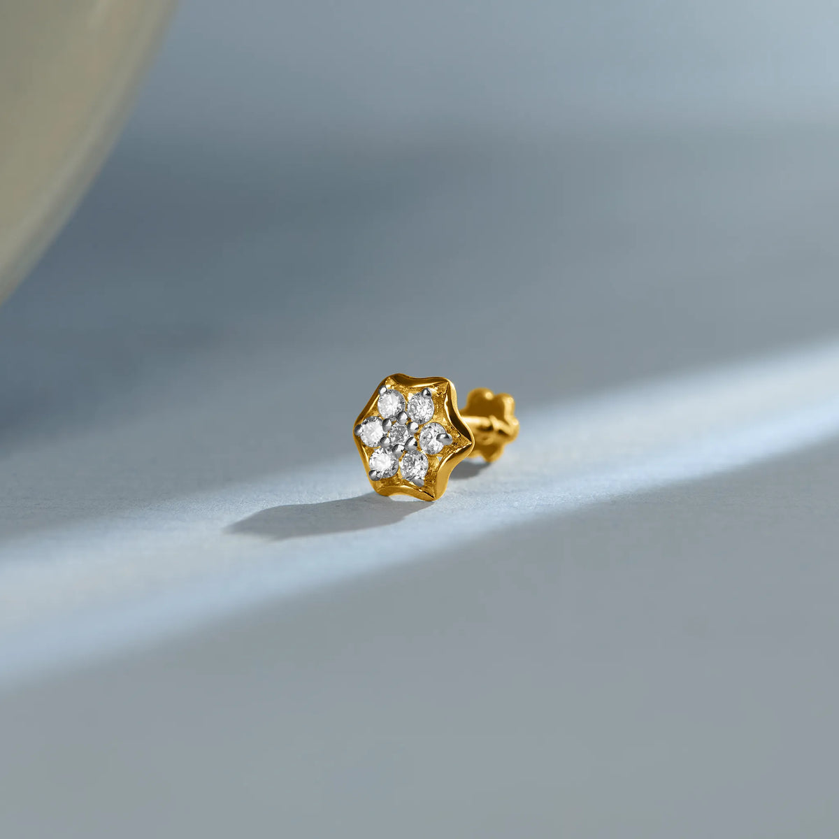 Six-point star diamond cluster stud earring in 14k gold