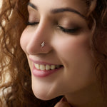  Model showcasing a delicate wheat-style diamond nose pin