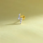 Lightning bolt-shaped diamond stud earring in 14k gold