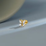 Lab grown diamond nose pin with butterfly design and sparkling diamonds on soft blue background