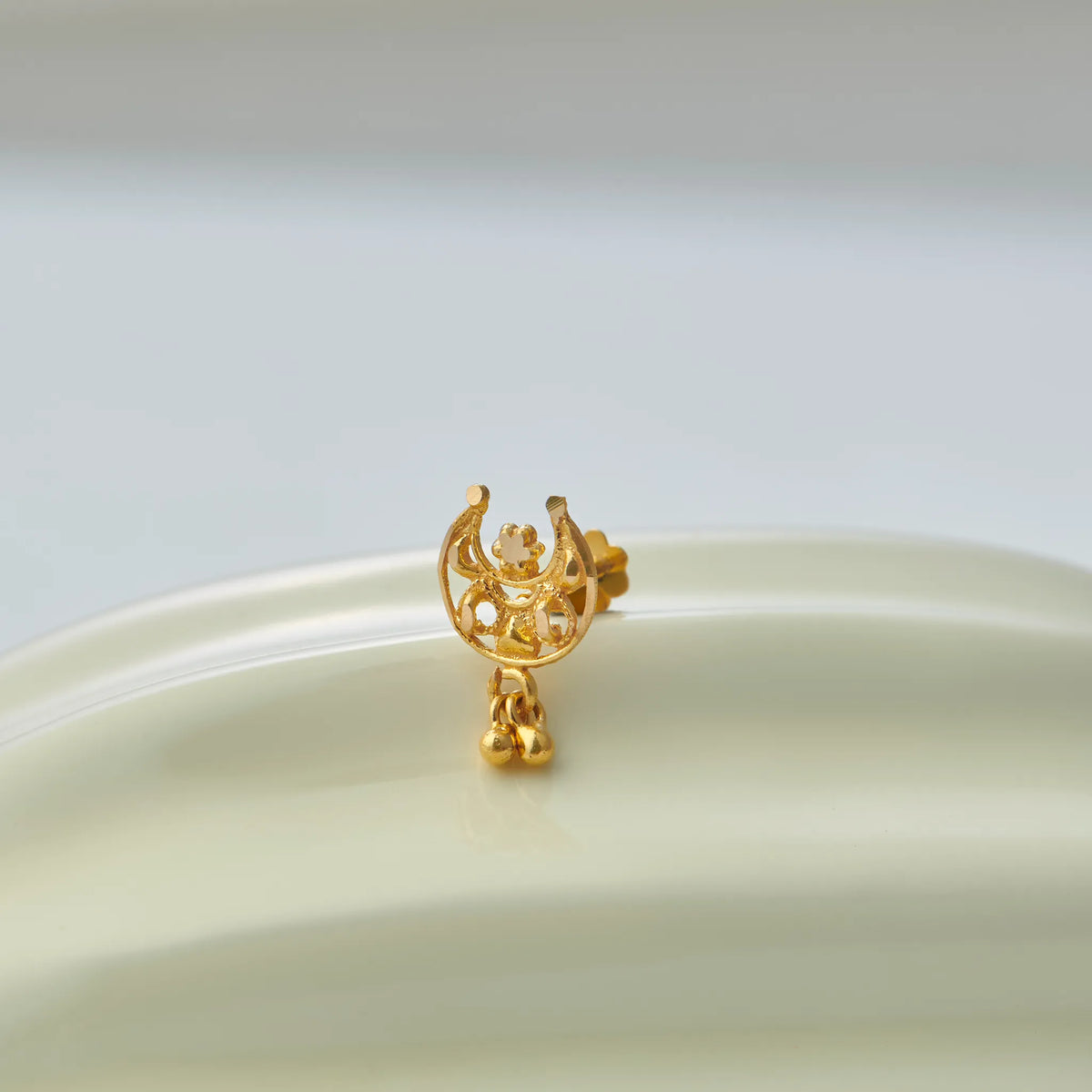 Crescent moon filigree gold stud earring with dangling ball charms