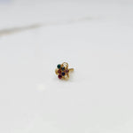 Another close front angle of the floral stone gold nose pin highlighting sparkle and finish
