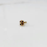 Gold flower nose pin with multicolor round stones