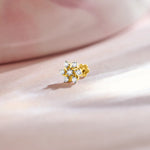 Pinwheel-style diamond flower stud earring in 14k gold