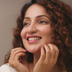 Nose pin gold worn on the nose in a close-up portrait, highlighting a charming and elegant everyday jewelry look