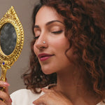 Nose pin gold worn on the nose in a close-up portrait, highlighting a stylish and elegant everyday jewelry look