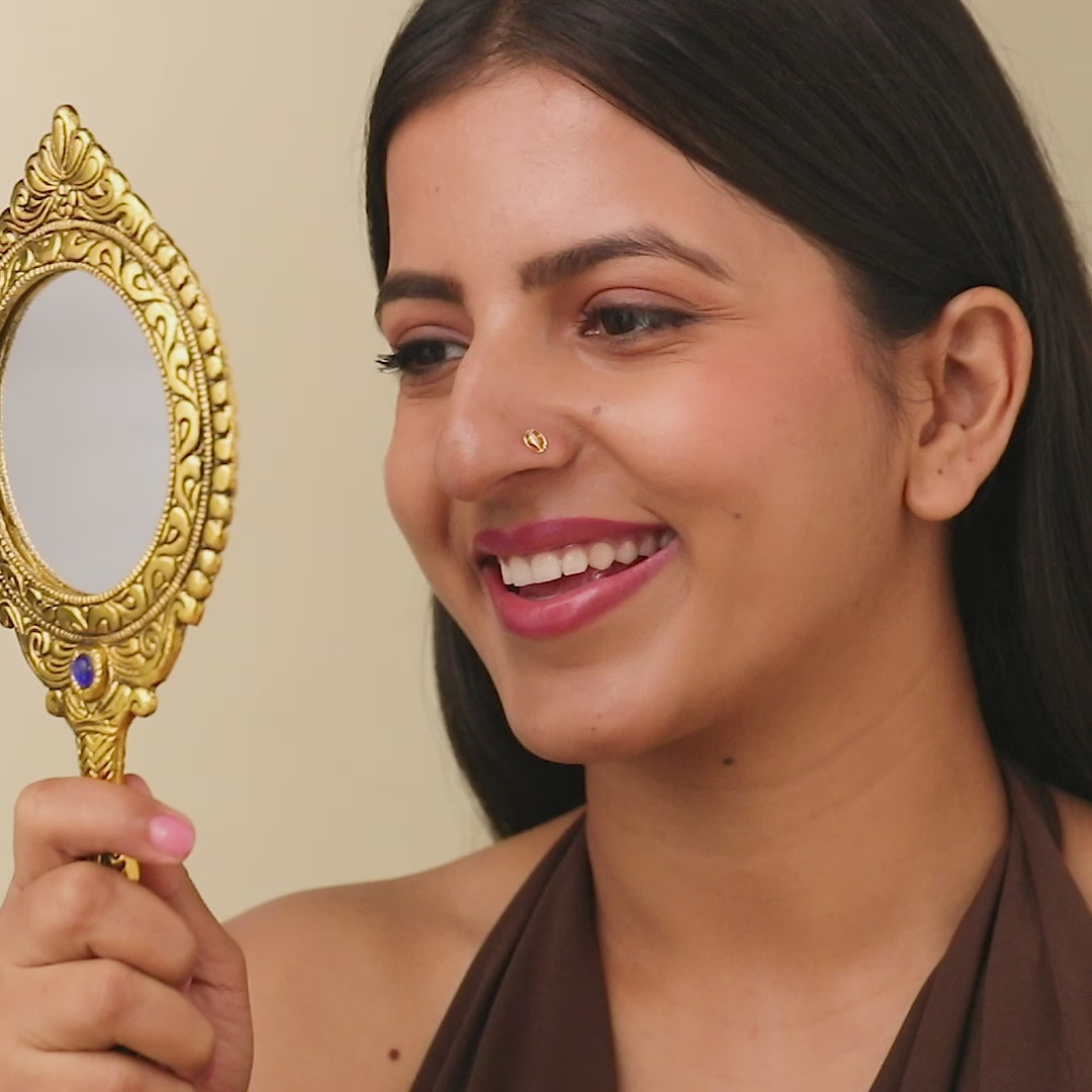 Divine Trunk -- 18K Ganeshji-Inspired Nose Pin Designs in Gold For Female