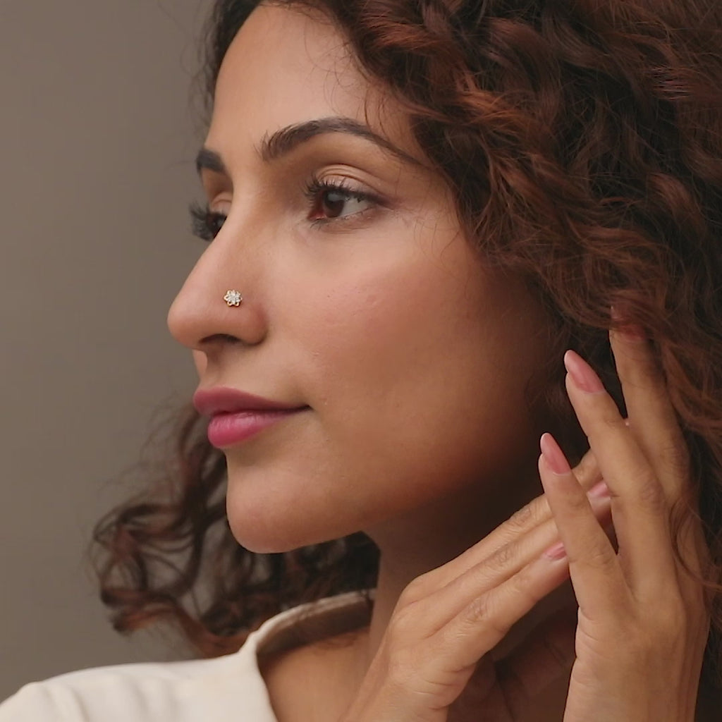 Nose pin gold worn on the nose in a close-up portrait, highlighting a graceful and elegant everyday jewelry look