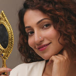 Nose pin gold worn on the nose in a close-up portrait, showcasing a sleek and elegant everyday jewelry style