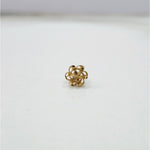 Radiant Filigree gold nose pin 18K close-up view with detailed floral filigree design on plain background