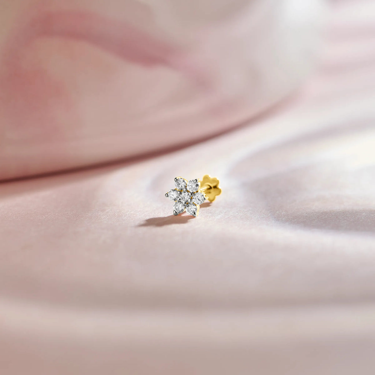 Round diamond flower cluster stud earring in 14k gold