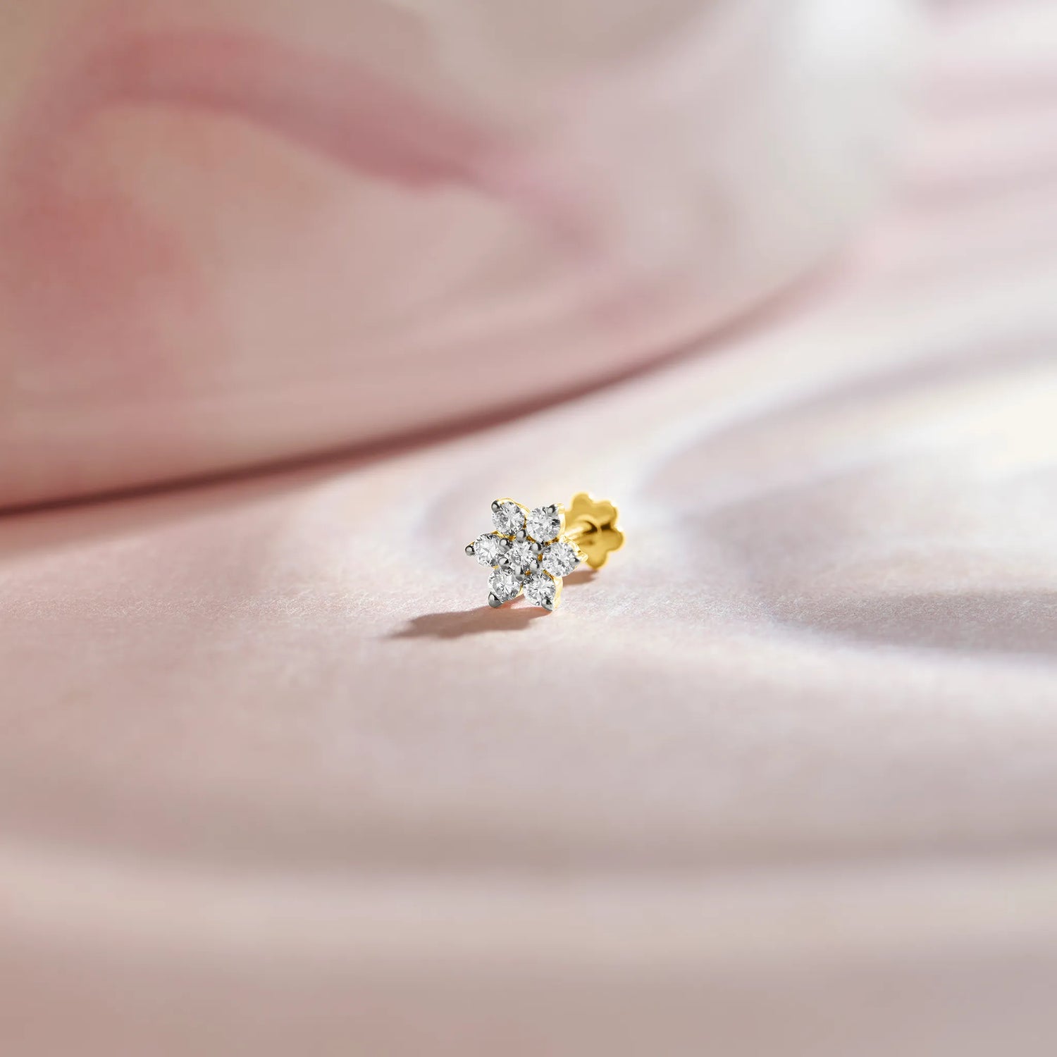 Round diamond flower cluster stud earring in 14k gold