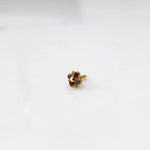 Gold cluster nose pin with ruby and brown stone details