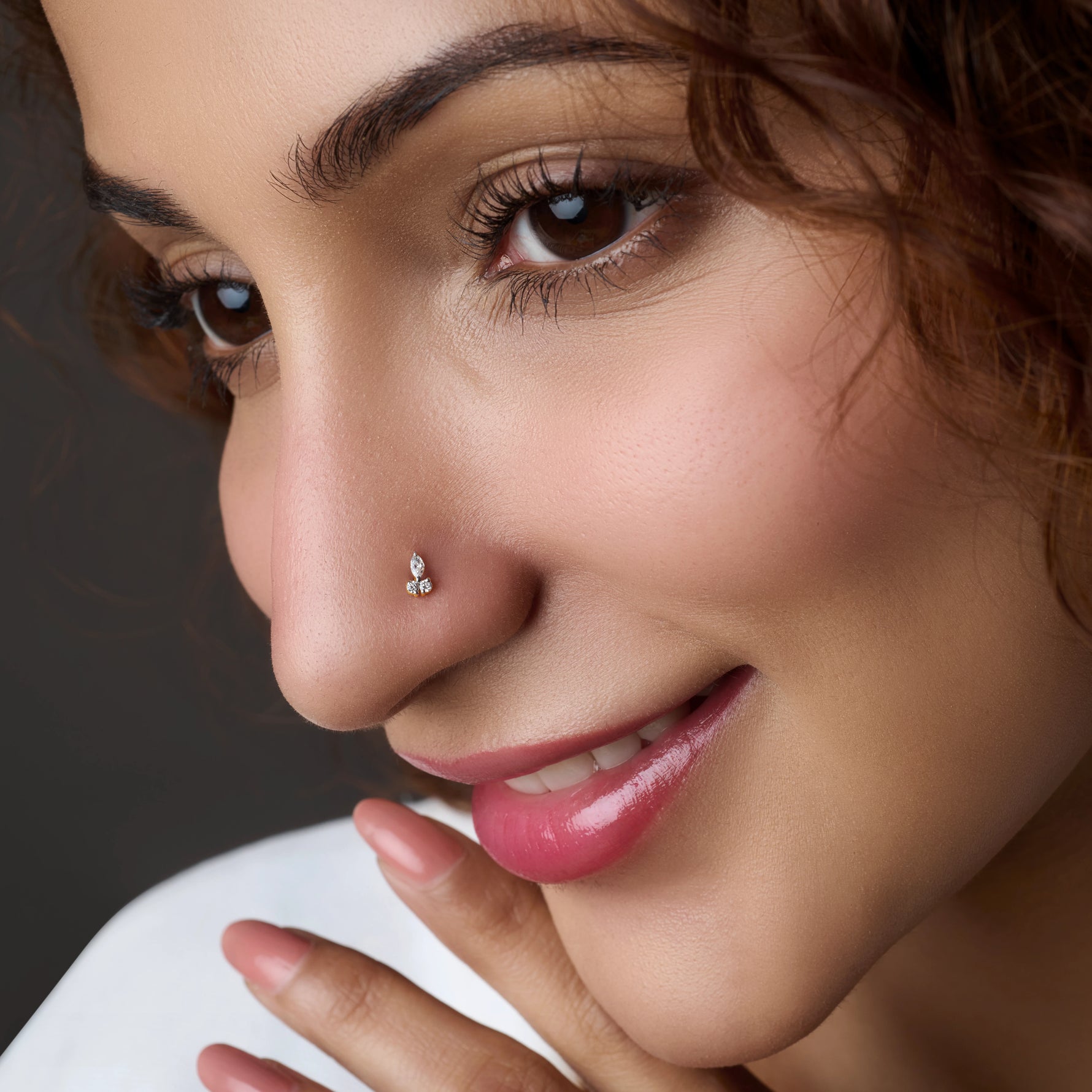Model wearing minimal double stone nose pin