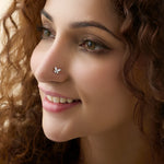 Woman wearing nose pin lab grown diamond with elegant butterfly diamond design