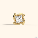Gold nose stud with prong-set diamond in open swirl design, cream backdrop