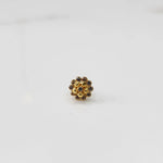 Gold floral cluster ring with champagne and clear stone detailing