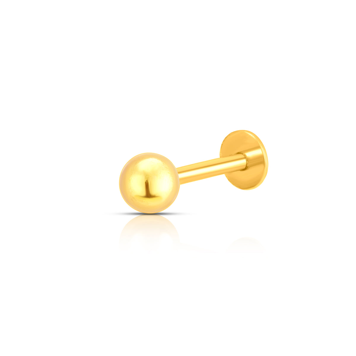 Close-up of small gold ball nose stud piercing on model